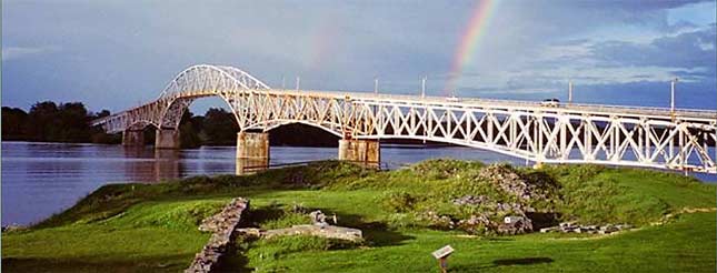 The 1929 Lake Champlain Bridge with a rainbow as seen from Crown Point State Historic Site in New York